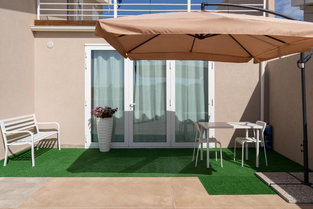 Patio nebo venkovní prostory v ubytování Nni Mia