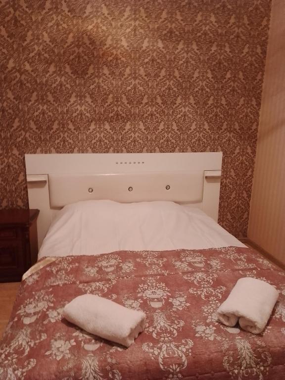 Postel nebo postele na pokoji v ubytování Tamuna Guest House