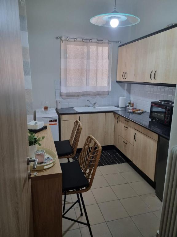 Kuchyň nebo kuchyňský kout v ubytování Piraeus open view Appartment