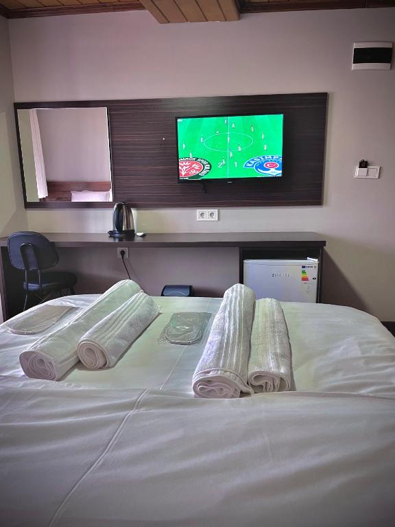 Postel nebo postele na pokoji v ubytování Gold Corner Hotel