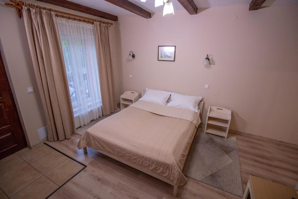 Postel nebo postele na pokoji v ubytování Veres