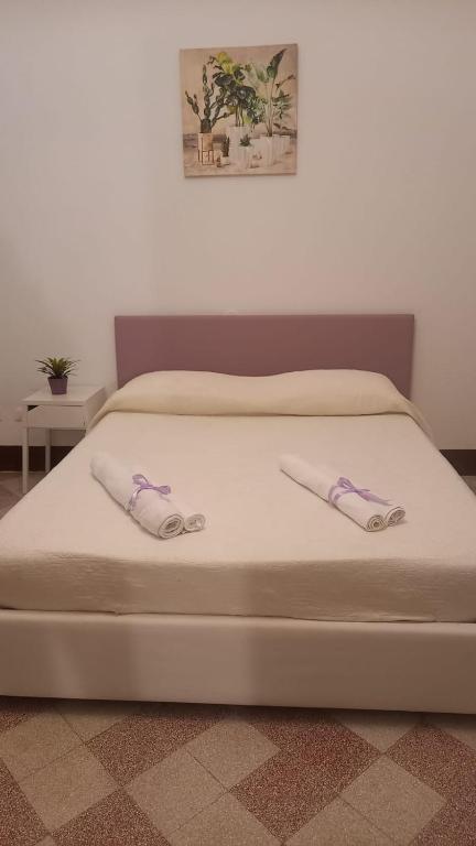 Letto o letti in una camera di Le stanze di Regina Margherita