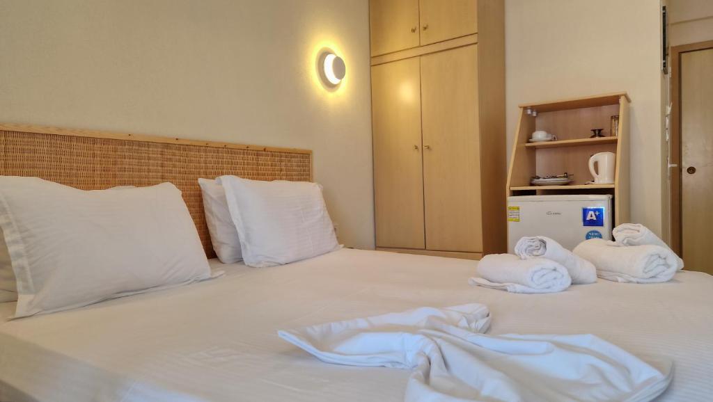 Postel nebo postele na pokoji v ubytování Hotel Viky