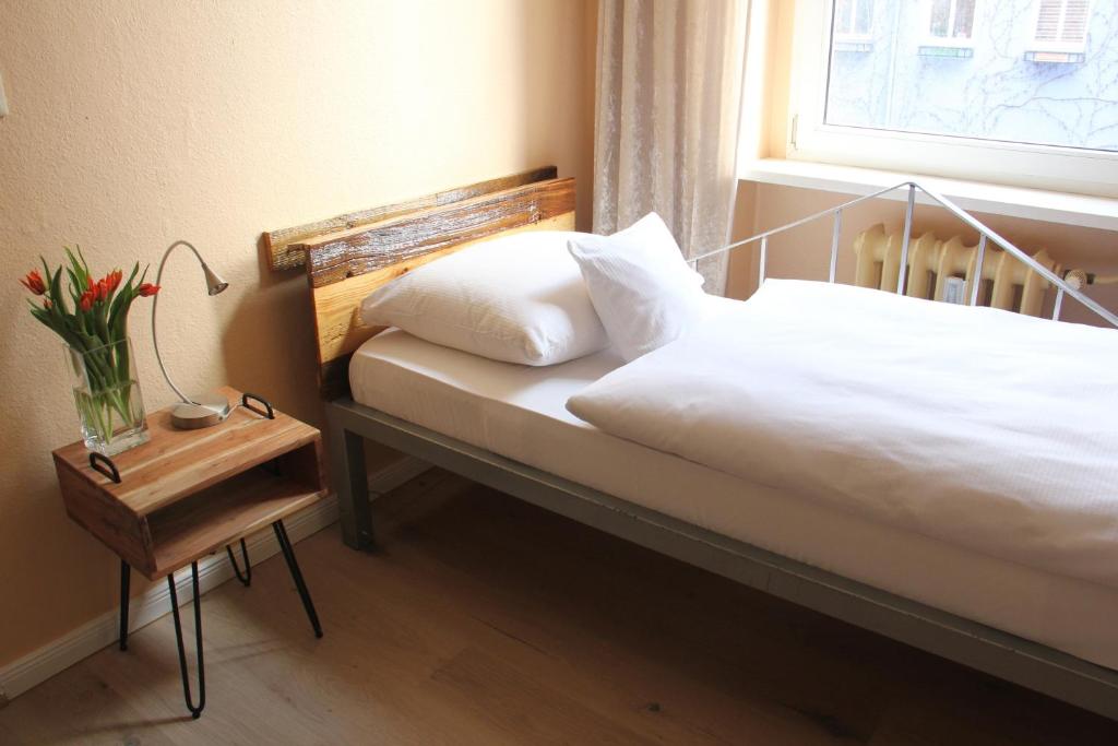 Postel nebo postele na pokoji v ubytování ArtHotel Connection