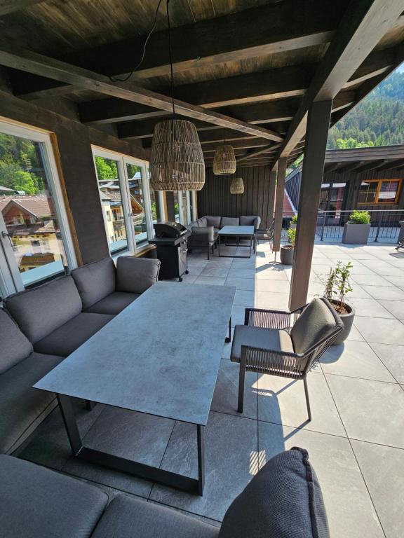 Posezení v ubytování Ferienwohnungen Karlingerhof am See