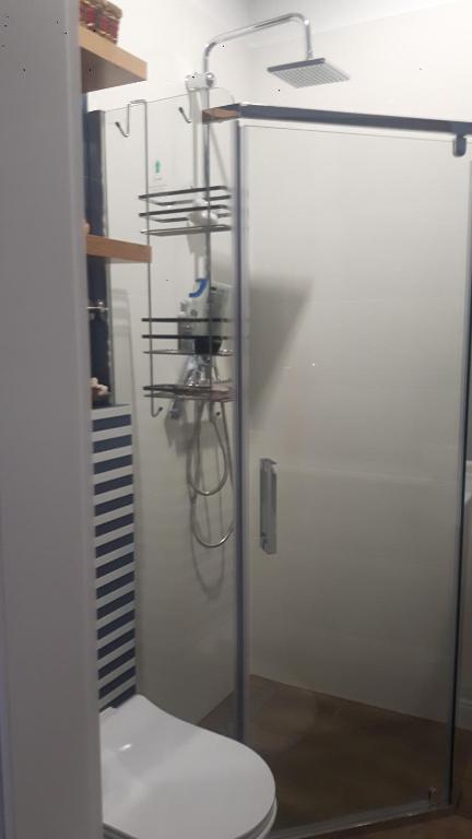 Kúpeľňa v ubytovaní Apartament pod brzozami -Tomaszkowo