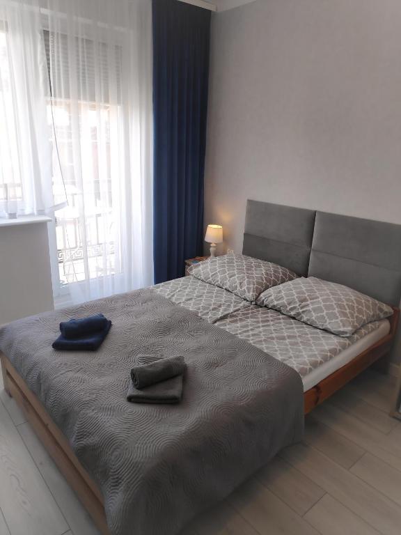 Postel nebo postele na pokoji v ubytování Pokoje gościnne Moli
