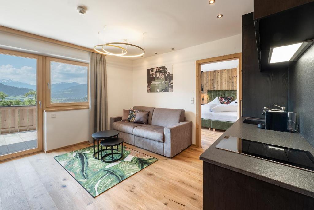 Postel nebo postele na pokoji v ubytování Hotel AlpenSchlössl