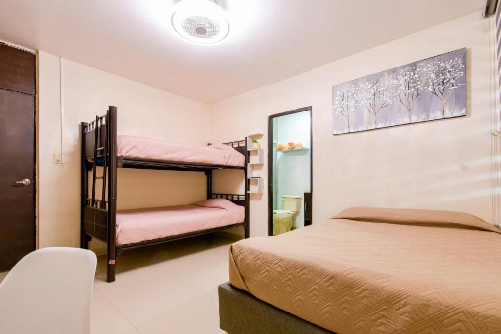 Postel nebo postele na pokoji v ubytování Hostal vitta