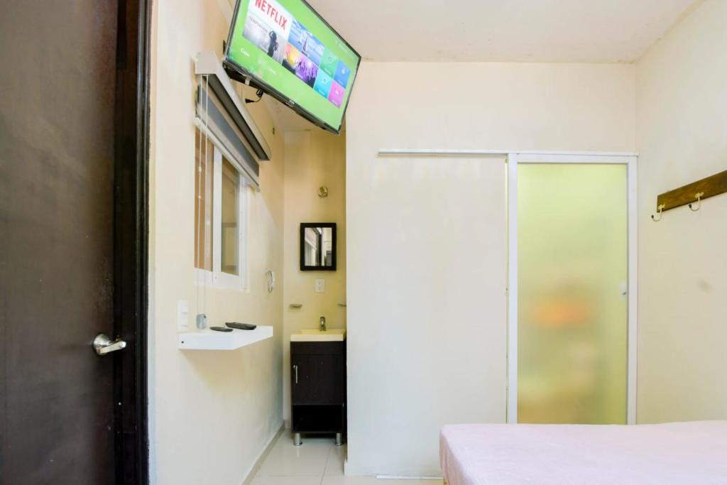 Postel nebo postele na pokoji v ubytování Hostal vitta