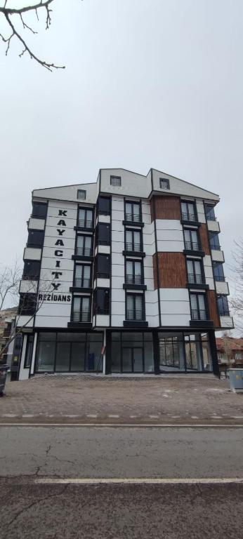 a building with a sign on the front of it at KAYA CİTY REZİDANS in Nevsehir