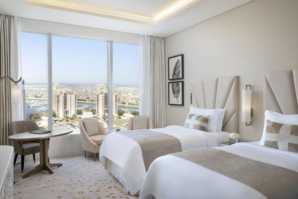 
Deluxe Twin Room with City View, KYMA beach access, Signature St. Regis Butler Service
