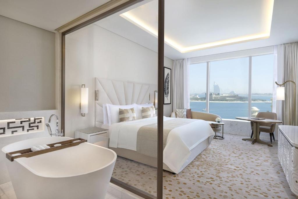 
Grand Deluxe King Room with Partial Sea View, KYMA beach access, Signature St. Regis Butler Service
