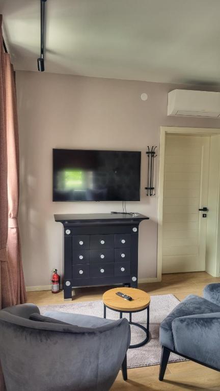 TV a/nebo společenská místnost v ubytování Casa Vita Nova