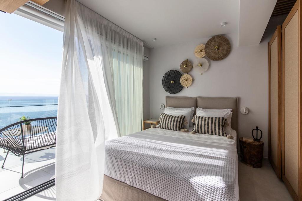 Postel nebo postele na pokoji v ubytování Nōema Premium Stay