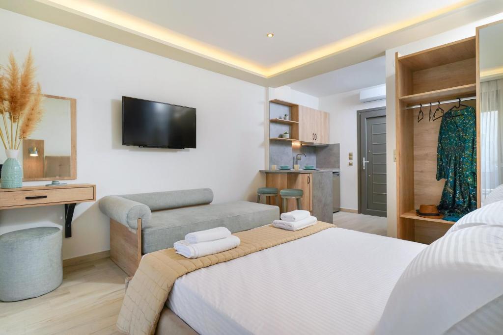 TV a/nebo společenská místnost v ubytování Yasemi Luxury Rooms