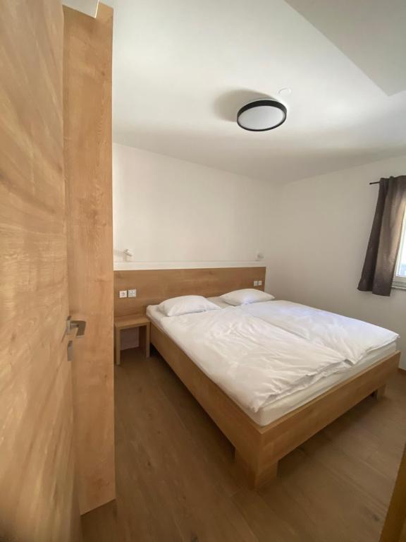 Postel nebo postele na pokoji v ubytování New Apartments Teravila