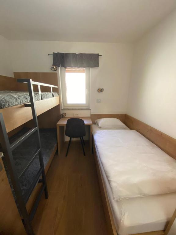 Postel nebo postele na pokoji v ubytování New Apartments Teravila