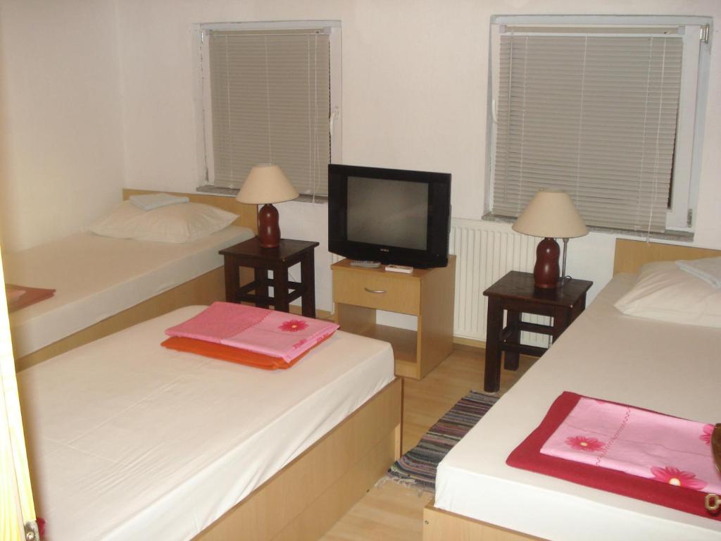 Postel nebo postele na pokoji v ubytování Hostel Hercegovina
