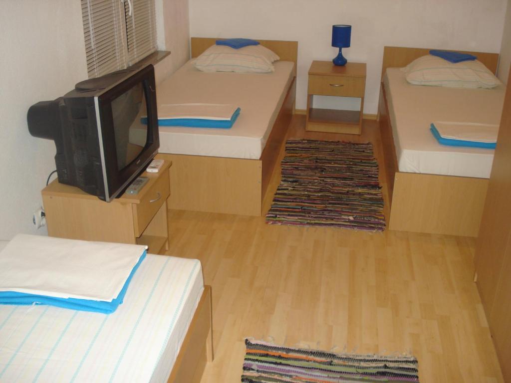 Postel nebo postele na pokoji v ubytování Hostel Hercegovina
