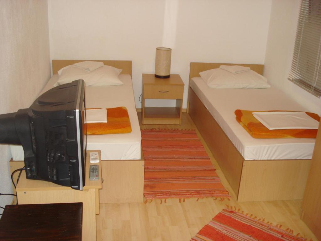 Postel nebo postele na pokoji v ubytování Hostel Hercegovina