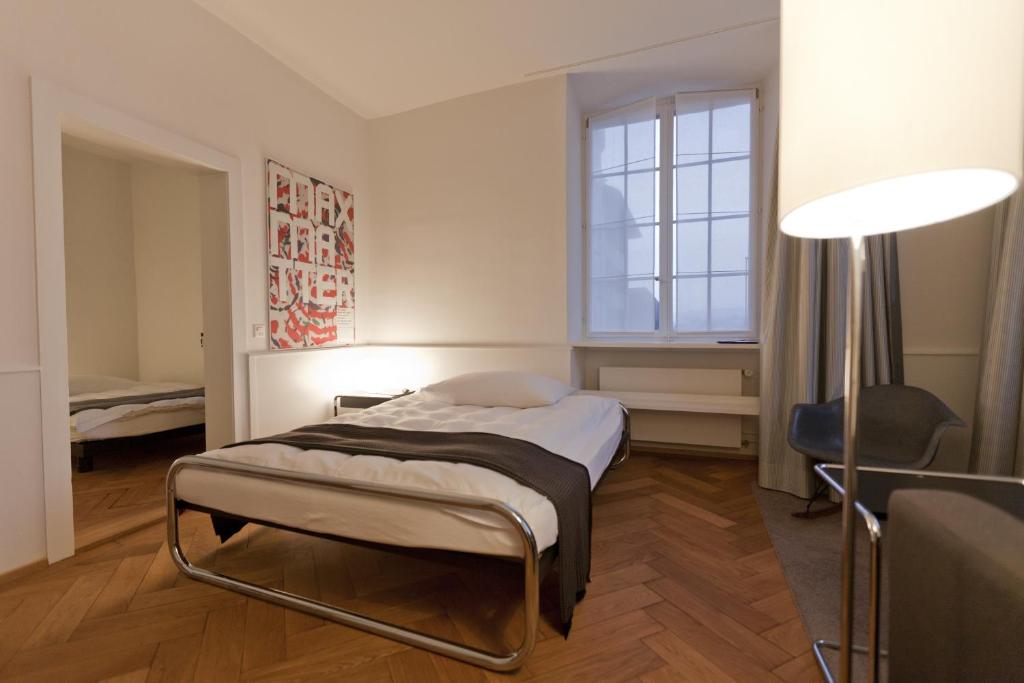 Postel nebo postele na pokoji v ubytování Baseltor Hotel & Restaurant