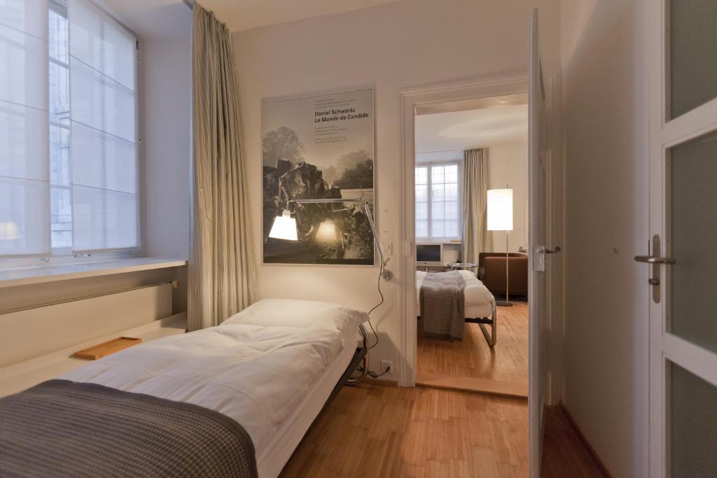 Postel nebo postele na pokoji v ubytování Baseltor Hotel & Restaurant