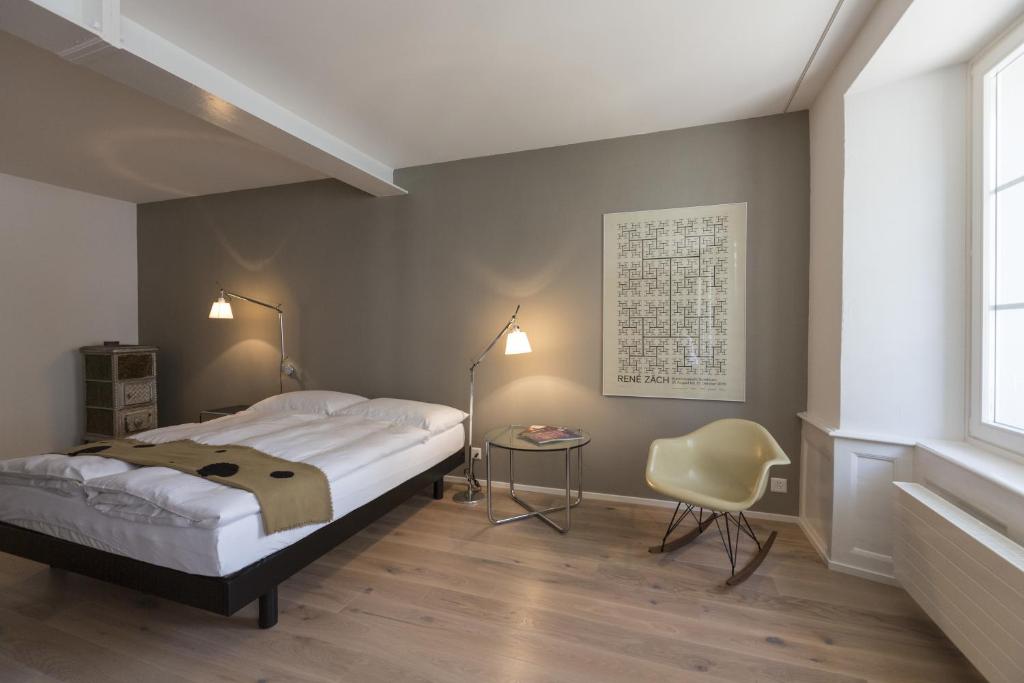 Postel nebo postele na pokoji v ubytování Baseltor Hotel & Restaurant
