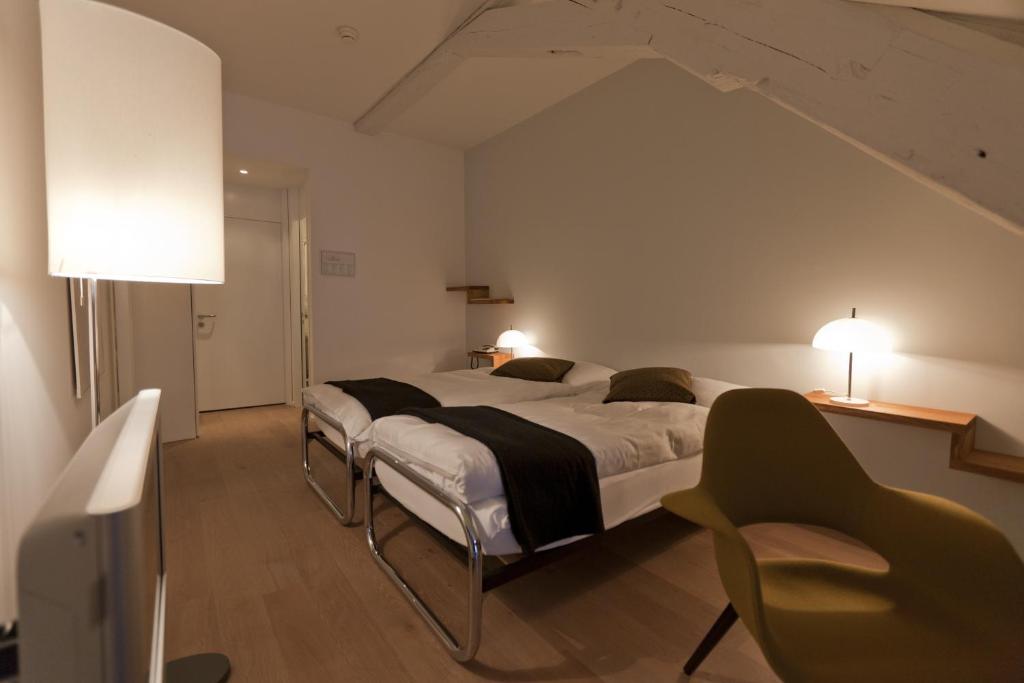 Postel nebo postele na pokoji v ubytování Baseltor Hotel & Restaurant