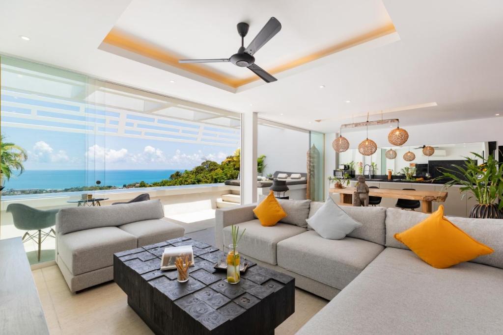 Posezení v ubytování STUNNING SEA VIEW DESIGN LOFT WITH INFINITY POOL - Aqua Villa Samui Atlantis 9