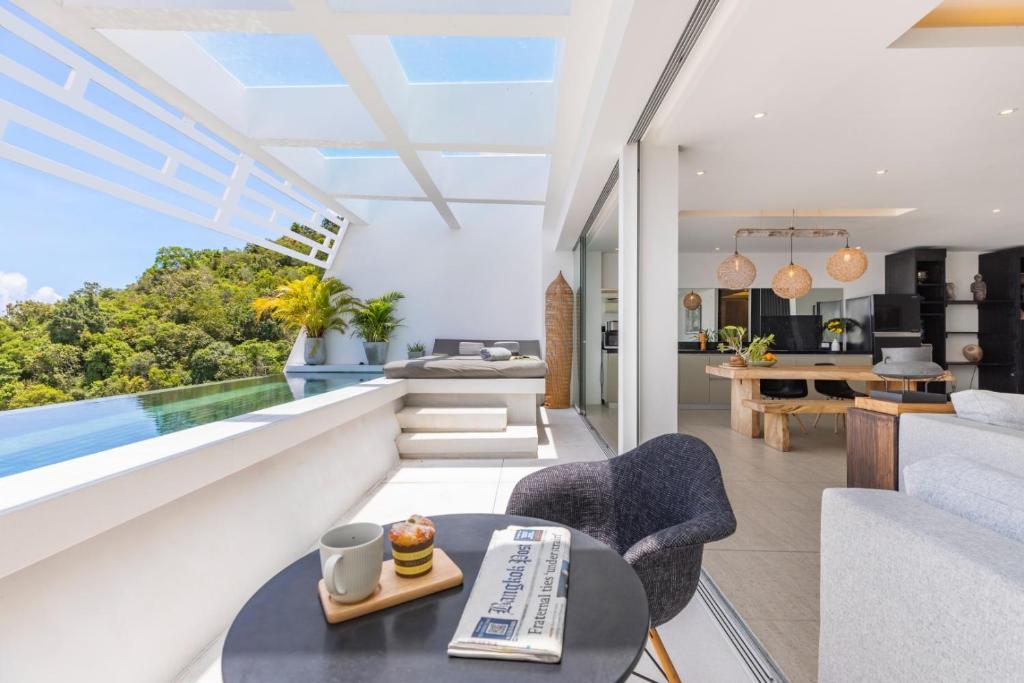 Posezení v ubytování STUNNING SEA VIEW DESIGN LOFT WITH INFINITY POOL - Aqua Villa Samui Atlantis 9