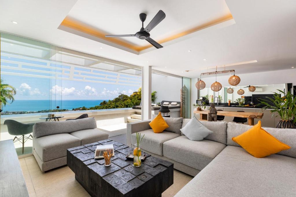 Posezení v ubytování STUNNING SEA VIEW DESIGN LOFT WITH INFINITY POOL - Aqua Villa Samui Atlantis 9