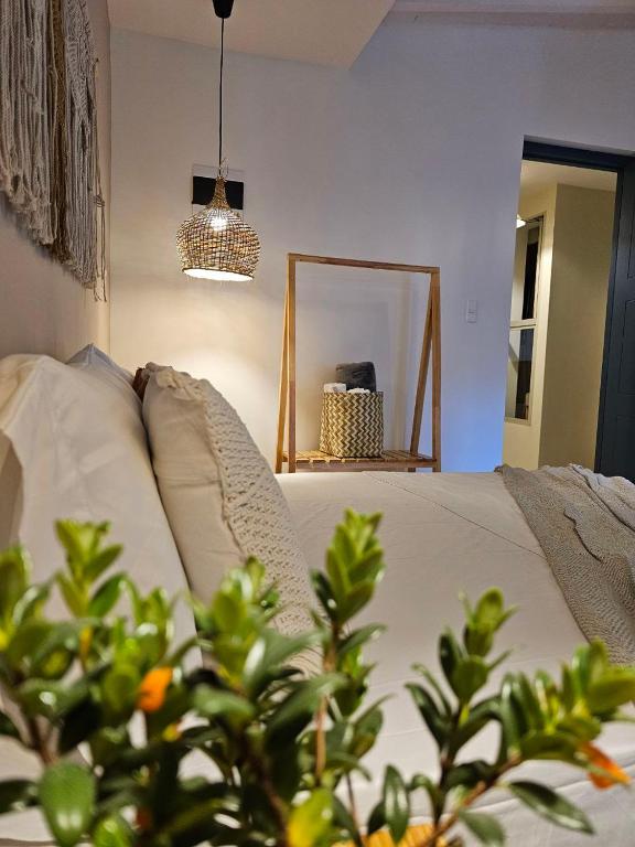 Postel nebo postele na pokoji v ubytování Poblado Luum Boutique hotel