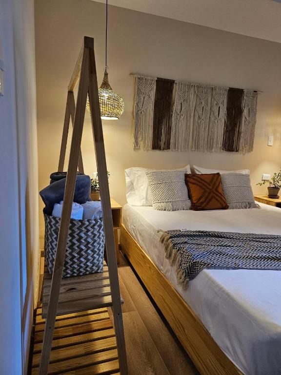 Postel nebo postele na pokoji v ubytování Poblado Luum Boutique hotel