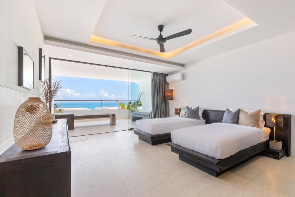 Posezení v ubytování STUNNING SEA VIEW DESIGN LOFT WITH INFINITY POOL - Aqua Villa Samui Atlantis 9