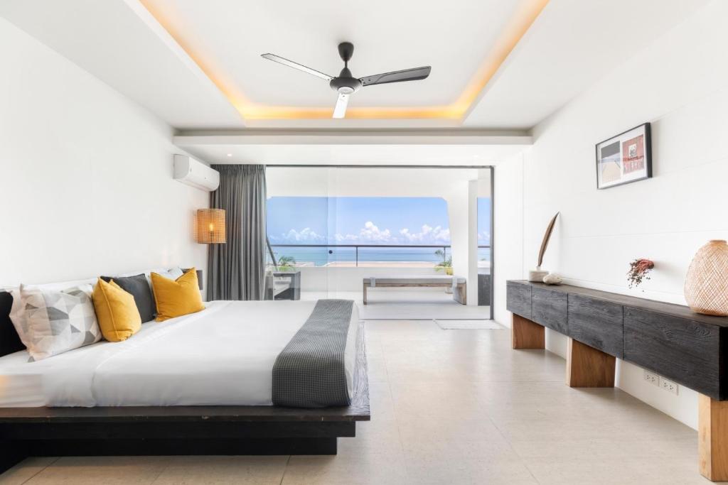 Postel nebo postele na pokoji v ubytování STUNNING SEA VIEW DESIGN LOFT WITH INFINITY POOL - Aqua Villa Samui Atlantis 9