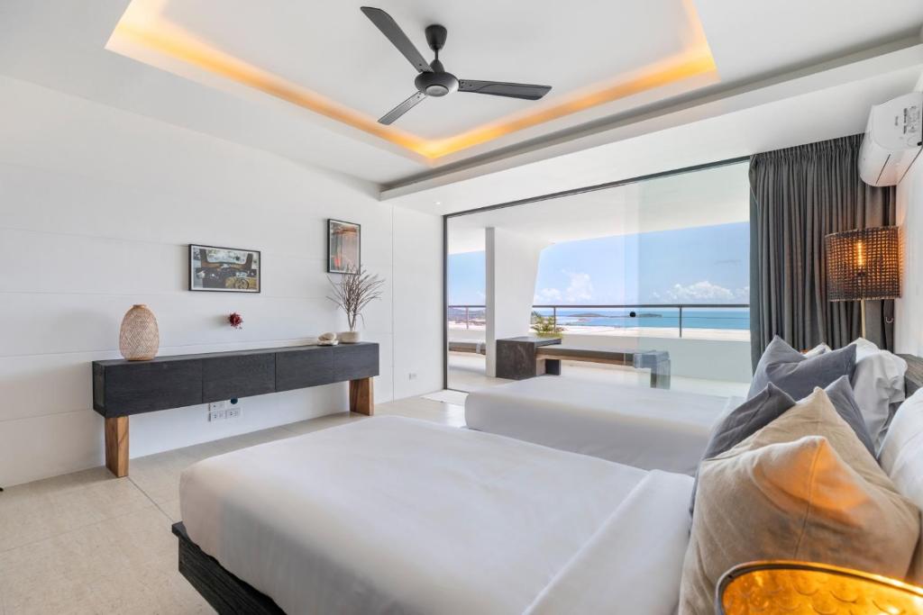 Postel nebo postele na pokoji v ubytování STUNNING SEA VIEW DESIGN LOFT WITH INFINITY POOL - Aqua Villa Samui Atlantis 9