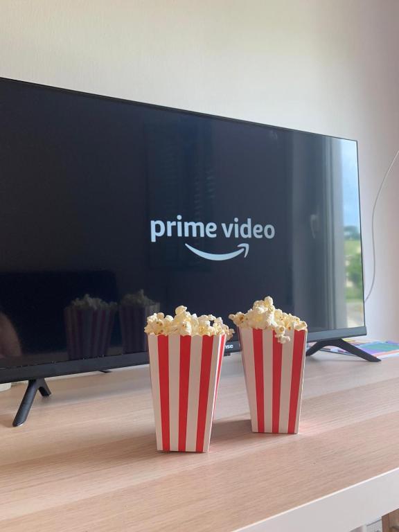 Televízia a/alebo spoločenská miestnosť v ubytovaní Just Relax