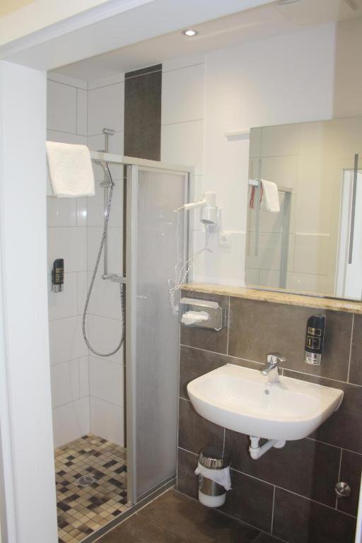 Koupelna v ubytování Hotel Harmshof Bispingen