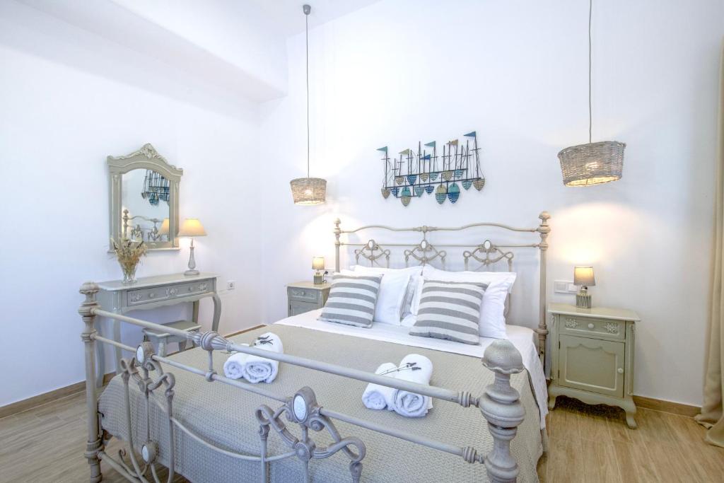 Postel nebo postele na pokoji v ubytování Arethousa House