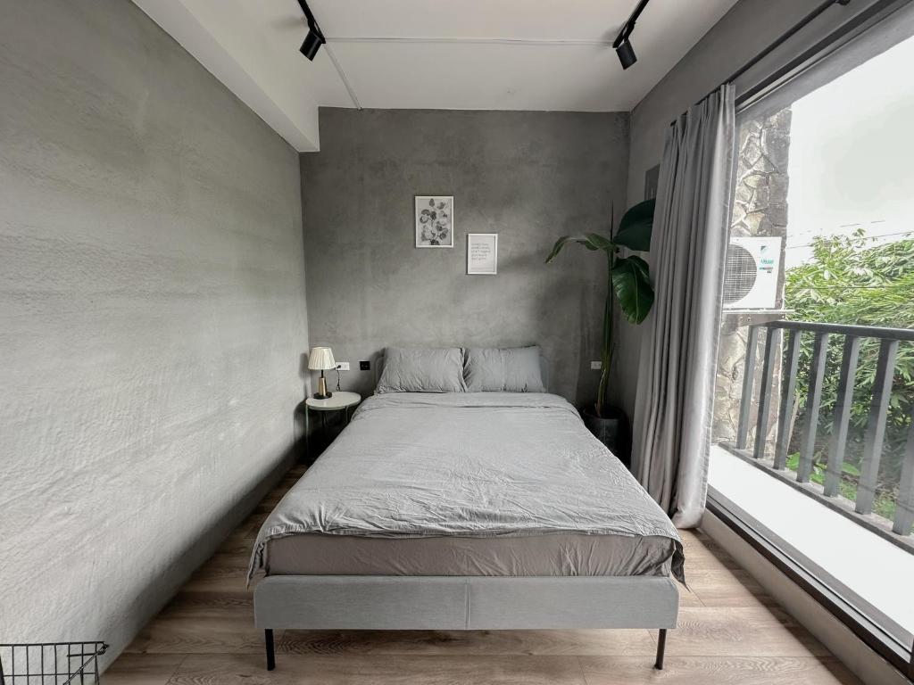 Letto o letti in una camera di hsueh_house