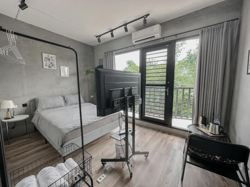 Letto o letti in una camera di hsueh_house