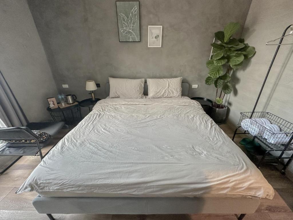 Letto o letti in una camera di hsueh_house