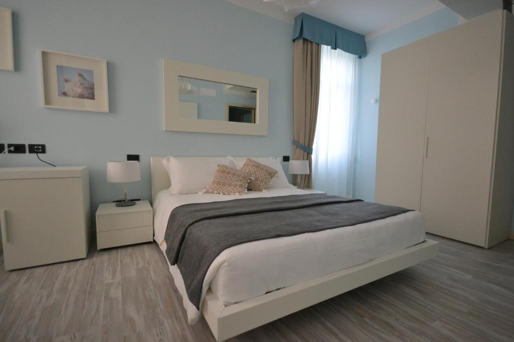 Łóżko lub łóżka w pokoju w obiekcie Hotel Villa Bernt