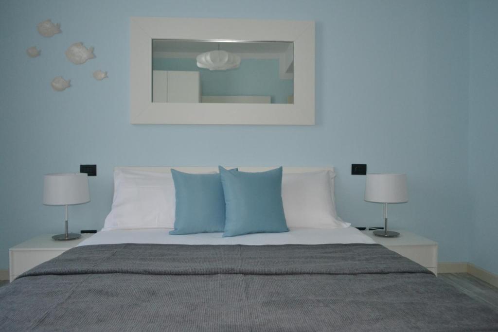 Łóżko lub łóżka w pokoju w obiekcie Hotel Villa Bernt