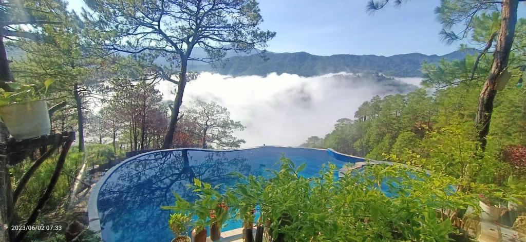 a view of the mountains from a glass house at IYAMAN FARM near SAGADA 