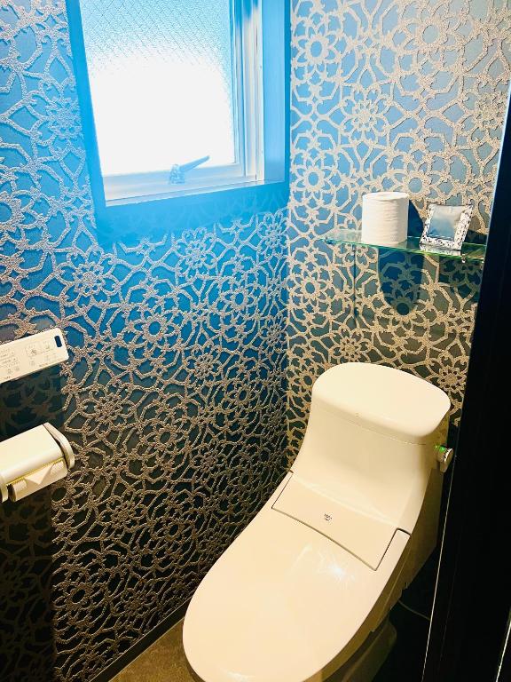 Koupelna v ubytování Asokono Hotel