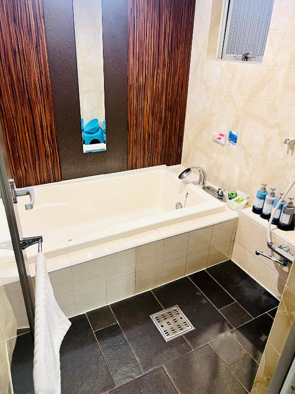 Koupelna v ubytování Asokono Hotel
