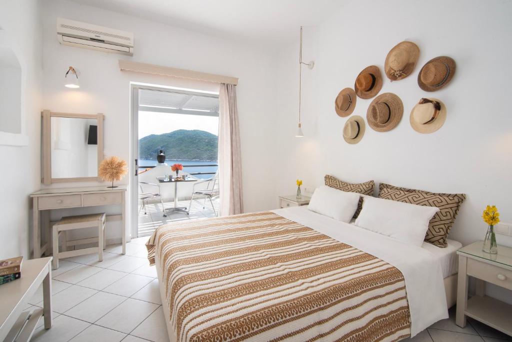 Postel nebo postele na pokoji v ubytování Nafsika Villas Apartments