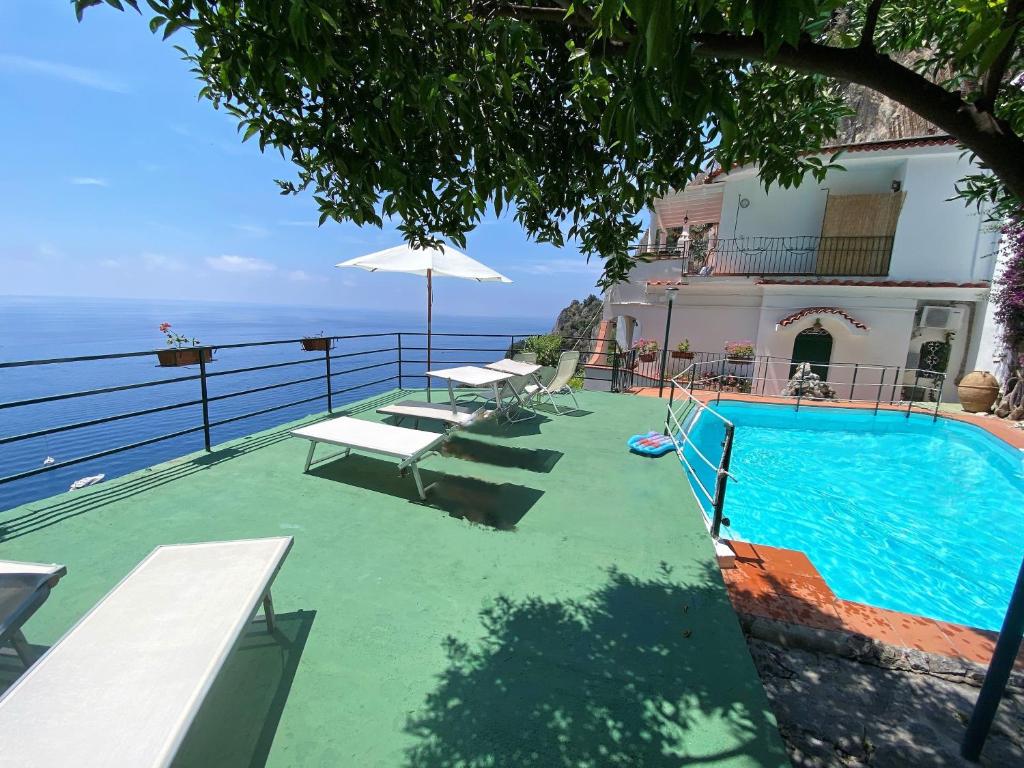 a swimming pool with a view of the ocean at Villa Carmela in Conca dei Marini